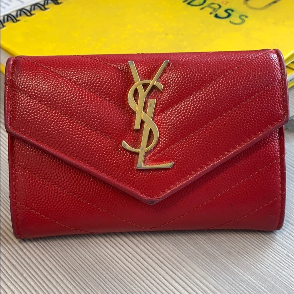 100 percent authentic YSL pondré envelope